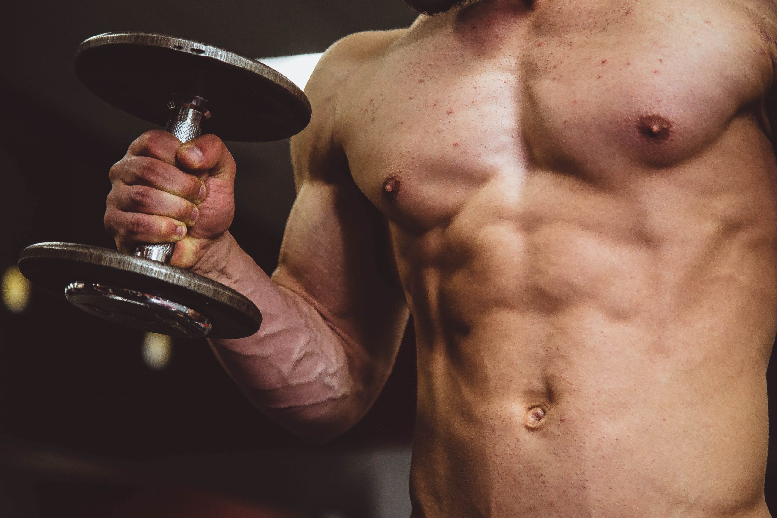 muscular man with dumbell