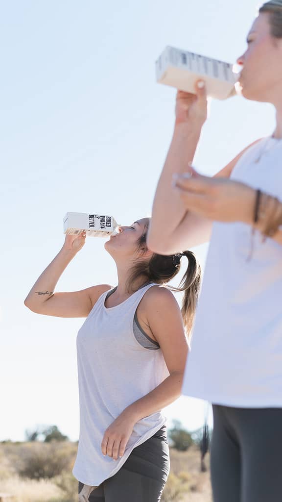 women drinking healthily outside