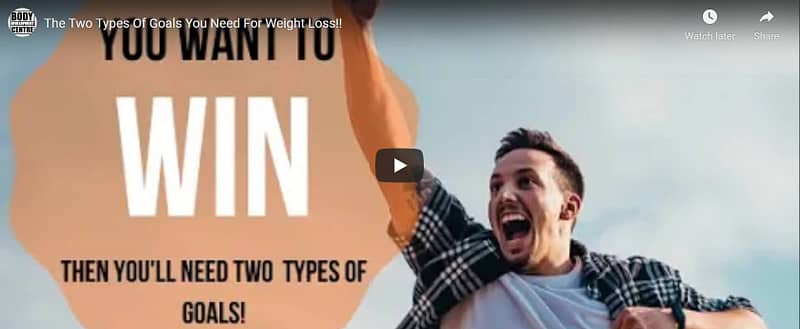 man punching the air - 'you want to win' motivational